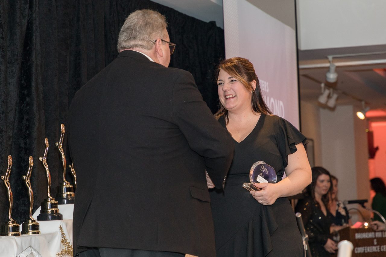 C21Realty North Ginny F Receiving Award